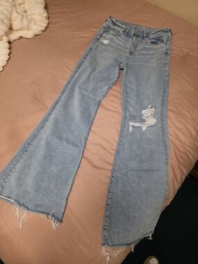 American Eagle Outfitters Light Blue Flare Jeans with Distressed Details